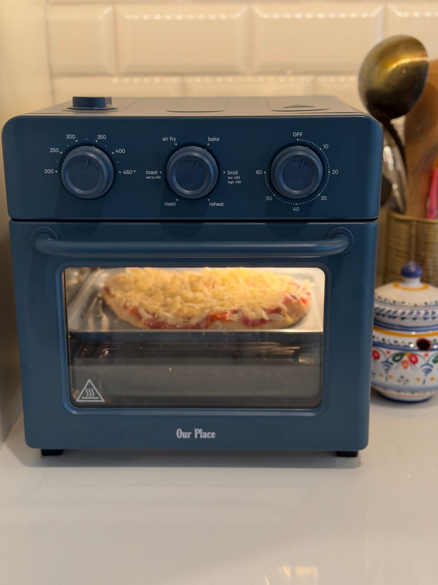 On the list of things I am SO GLAD I GOT. game changer in the kitchen for me. It’s an air fryer, oven, toaster, reheater all in one. So simple. So cute and makes so many foods! 
Truly makes my life easier. 
Dinner prep is cut in half. 

I use it every single day. Multiple times a day. 

Home appliance. Kitchen tool. Kitchen must haves. 

Wonder oven. 

#LTKdayinmylife #LTKHome #LTKmomlife