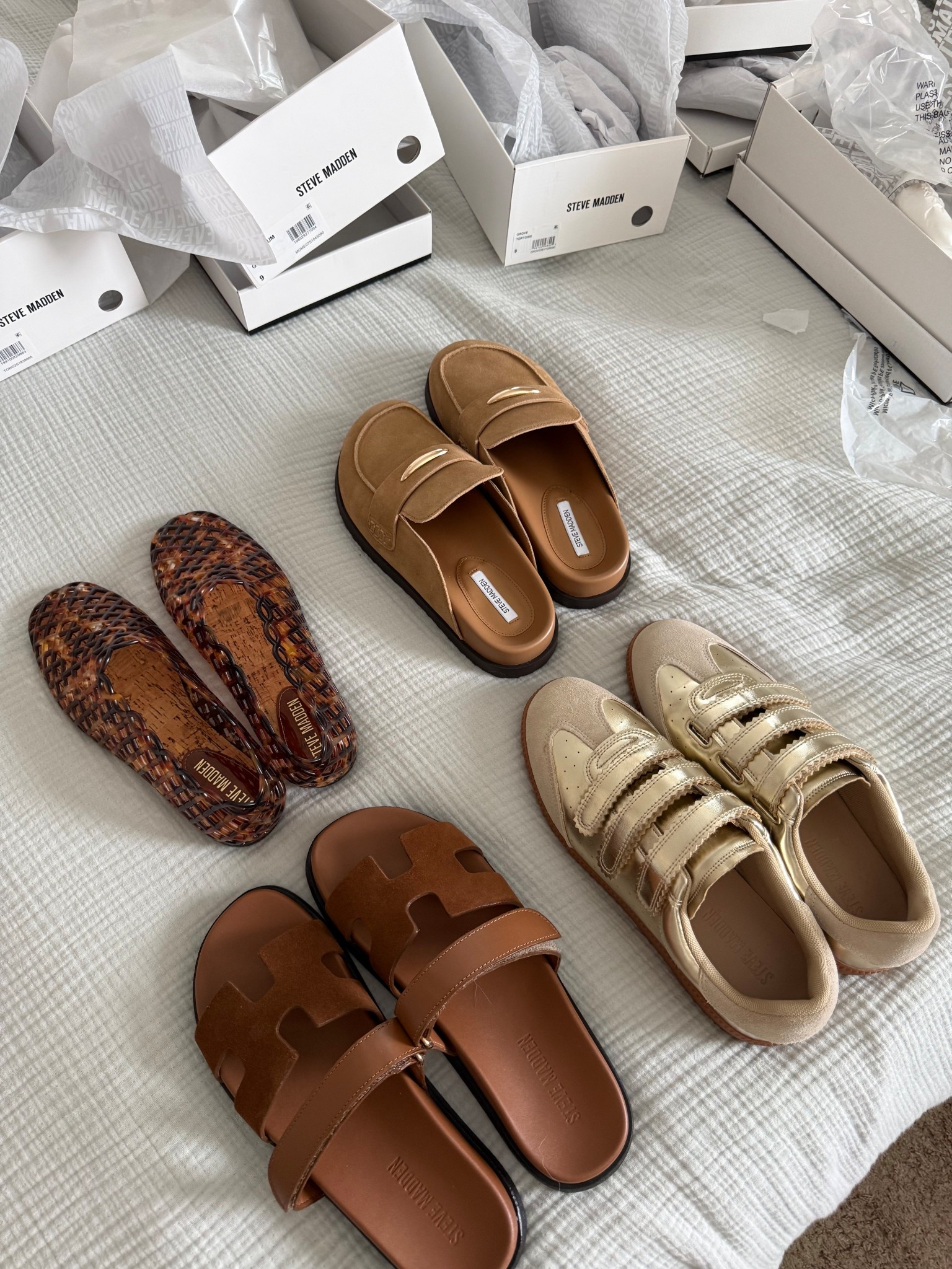 @Steve Madden US spring shoe haul. By the time the snow melts, I’m ready (and impatiently waiting) to wear all of my spring styles. 

Sizing notes starting top left: 

GROVE TORTOISE- ordered size 9, could have sized down 1/2 size. Roomy, stretchy, love the cork bottom so no sweaty feet issues 

TOBIN- Run VERY small. Ordered 8.5 would have sized up an entire size 

MAYVEN- sandal dupe for Hermes and true to size. Ordered an 8.5, Velcro is adjustable across top of foot so would be friendly for wide feet 

MOMENTUM - gold sneakers and probably my favorite style. Ordered size 9, but these run large so could have sized down. Super comfortable, also Velcro is adjustable on all 3 straps so these will make the perfect travel shoe to adjust to swelling tired feet. 

#LTKSeasonal #LTKSaleAlert