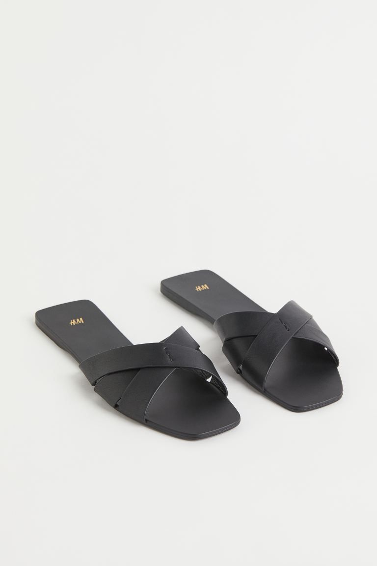 Slides in faux leather with wide, crossover foot straps and square toes. Faux leather lining and ... | H&M (US)