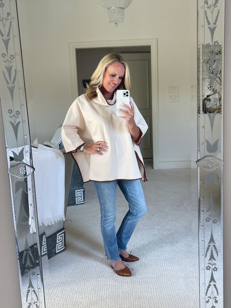 Cream poncho and jeans 

#LTKstyletip #LTKshoecrush #LTKSeasonal