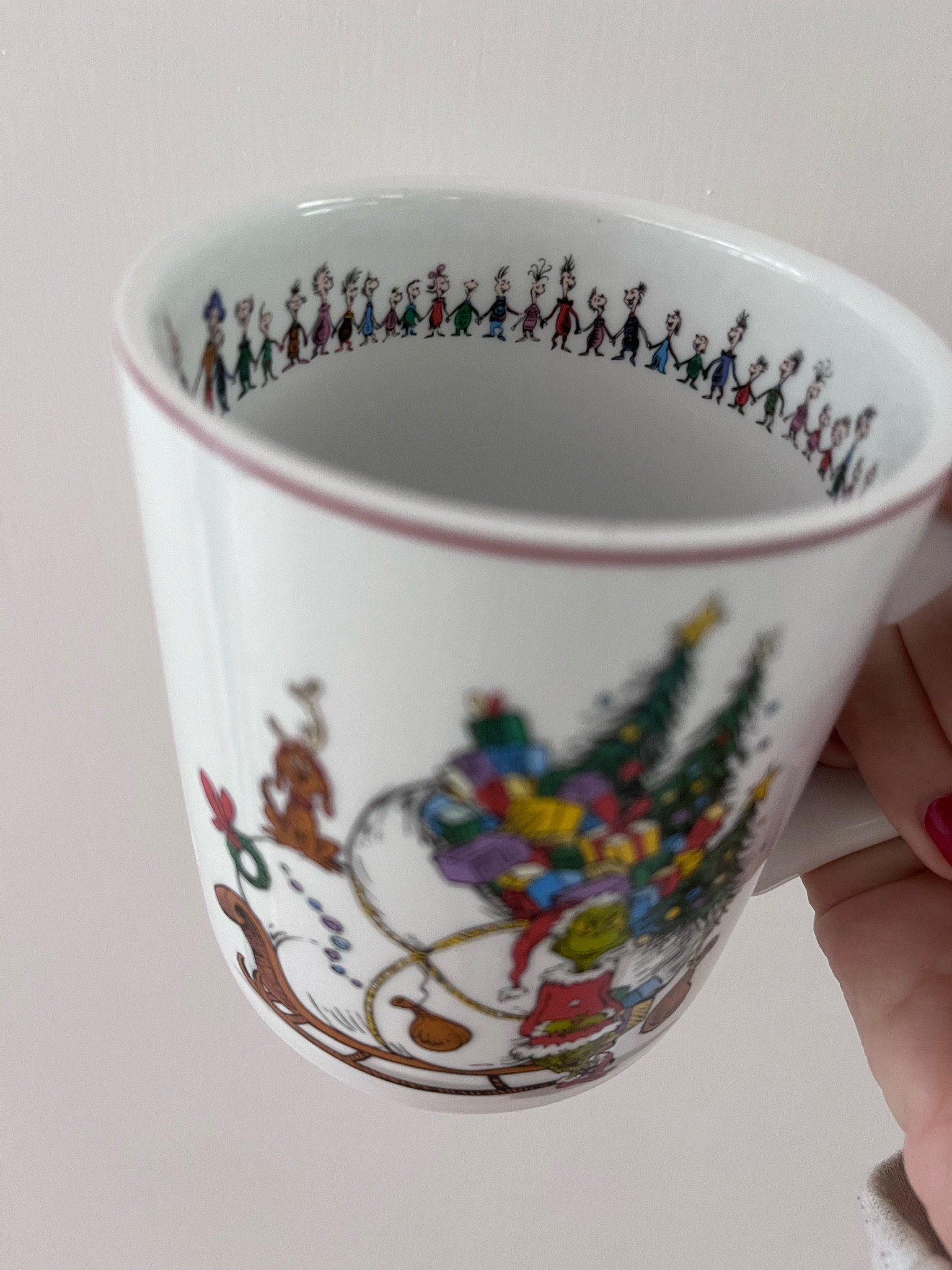 the cutest part about this grinch coffee mug is the little whos all lined up inside holding hands! williams sonoma christmas kitchen decor, black friday deals 2022

#LTKhome #LTKSeasonal #LTKHoliday