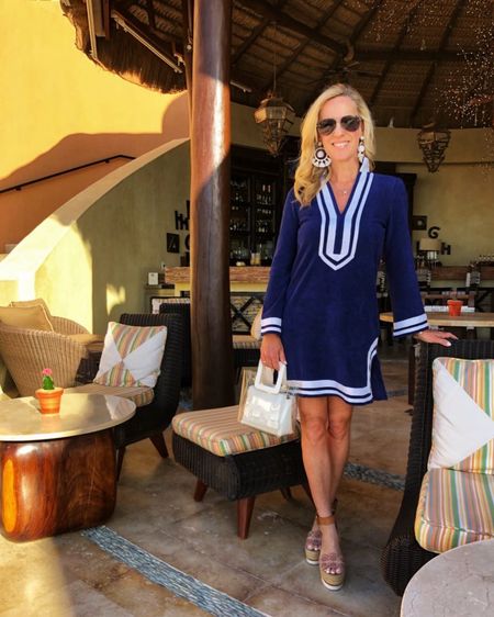 Perfect dress for a beach vacation!

Long sleeve navy and white tunic dress paired with handbag and espadrille wedges 

#LTKSeasonal #LTKstyletip #LTKFind