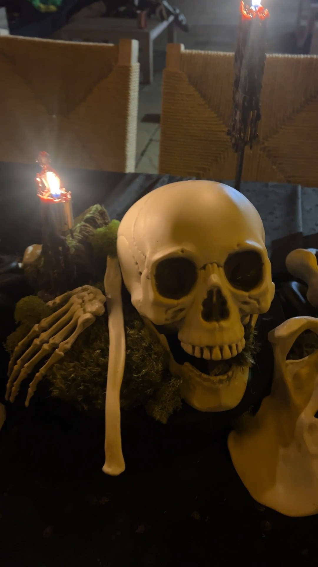 Create this table runner of bones and bloody tapers  

#LTKParties #LTKHalloween #LTKSeasonal