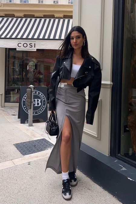 jupe mi-longue gris anthracite à pinces et taille repliée PLT crop top bandeau blanc veste en cuir bomber courte noire Adidas Samba noires et grises 

#LTKstyletip #LTKshoecrush #LTKFind