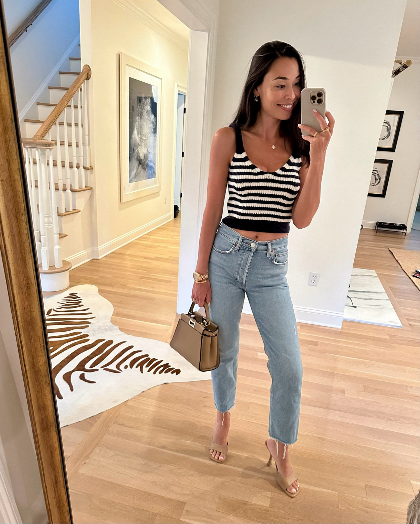 Kat Jamieson wears a stripe top and denim jeans. Date night outfit, stripes. 

#LTKShoeCrush #LTKSaleAlert #LTKSeasonal
