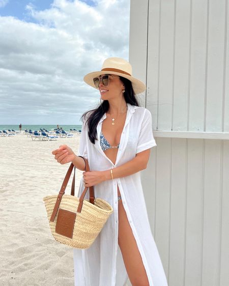 Kat Jamieson wears a white linen like dress as a coverup with an Etro bikini and Loewe bag in Miami. Vacation, beach, swimwear, swimsuit, swim, bathing suit, straw tote, summer, resortwear. 

#LTKswim #LTKSeasonal #LTKtravel