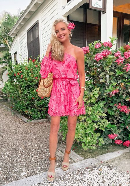 🌸 RESTOCK ALERT 🌸 This stunning vacay-ready pink dress is my favorite piece I packed for my trip to Belize last year! 

I LOVE the bright bold color, sexy one-shoulder style, and gorgeous fabric. The tie-belt highlights the waist, making it super flattering. It also has the most beautiful eyelet trim details. The lightweight material is very breathable and comfortable. And it hardly takes up any room in your suitcase! 

~Erin xo 

#LTKtravel #LTKSeasonal #LTKstyletip