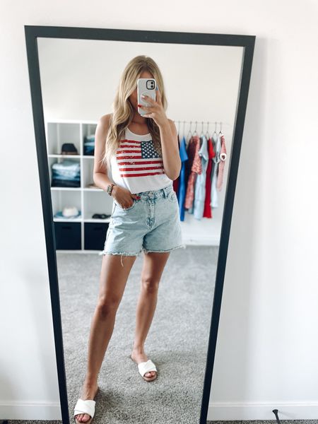 4th of July outfit!
USA flag tank: true to size, wearing M
Denim shorts: true to size 
White slides sandals: I sized up half but I think I could’ve stuck with my true size 


#LTKFindsUnder100 #LTKSeasonal