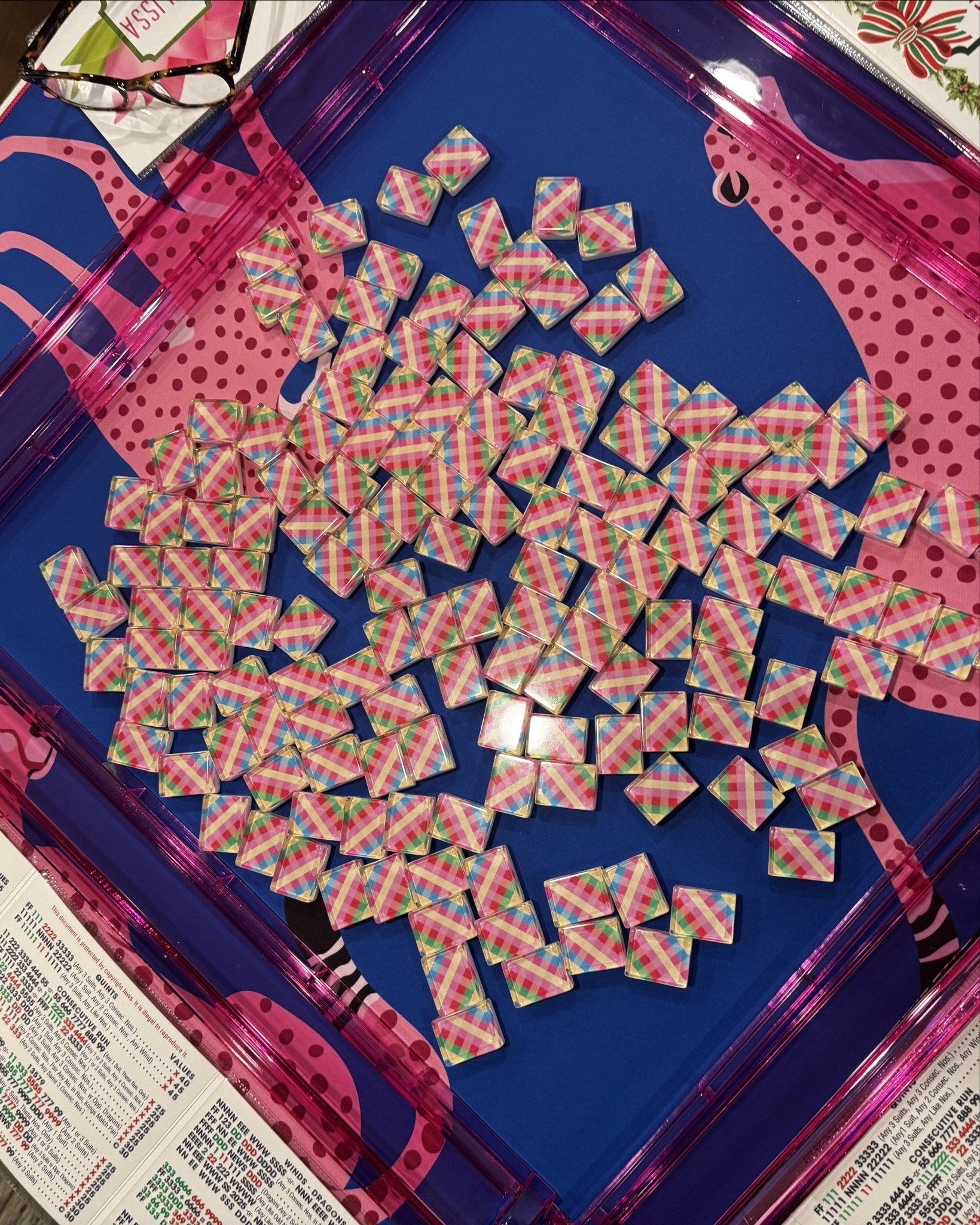 New to Mahjong? Let’s get you equipped!
This post is to help you get started or help you decide how to gift a friend so they can get started. 
You need a mat, a set of tiles, and racks.  If you don’t have a table small enough to set up, then get a foldable card table. The extras are the carrying case and storage cases for the mats, the tiles and the dice.

I have linked a moderately priced all in one set that I have played in person and it’s a great beginners/intermediate set. Note: it has traditional engraved tiles.

I have also linked a great printed tile set (they are usually engraved tiles), but this set is inexpensive and has custom characters (not traditional ones). You can then pair with the linked racks and a mat.
It would be perfect as a beginners set.

I have also linked the Oh My Mahjong tile dupes that you can get for half the retail price. I have linked a few sets that are on the Anthropologie website for reference. 

I have also linked a Prada set for anyone interested in seeing just how expensive this game can be :)

mahjong websites that sell designer custom tile sets and accessories...
Ohmymahjong.com
Myfairmahjong.com
Themahjongline.com
Bkmahjong.com 
Bespokemahjong.com

#LTKHoliday #LTKSeasonal #LTKGiftGuide