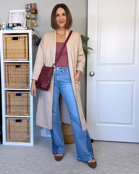 Spring outfit idea - trying to incorporate a bit more color and a pop of leopard, a fun spring trend!
Wearing my usual S in the scoop neck top, sized up to M in the long cardigan (this is the 4th color I have it in, it’s such a good layering piece!) and my usual size 27 regular length in these fun flare jeans.
The leopard flats fit snug, I sized up 1/2 size.
The bag has two different straps and lots of inside pockets and is real leather, comes in several colors.


#LTKitbag #LTKshoecrush #LTKstyletip