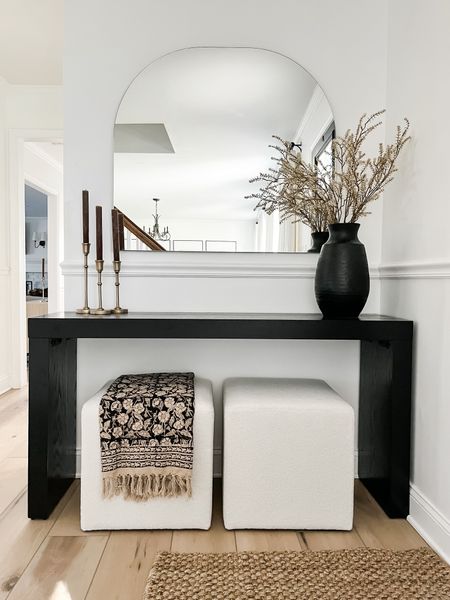 Entryway ideas! Black console table, white boucle ottomans, pottery barn mirror

#LTKhome