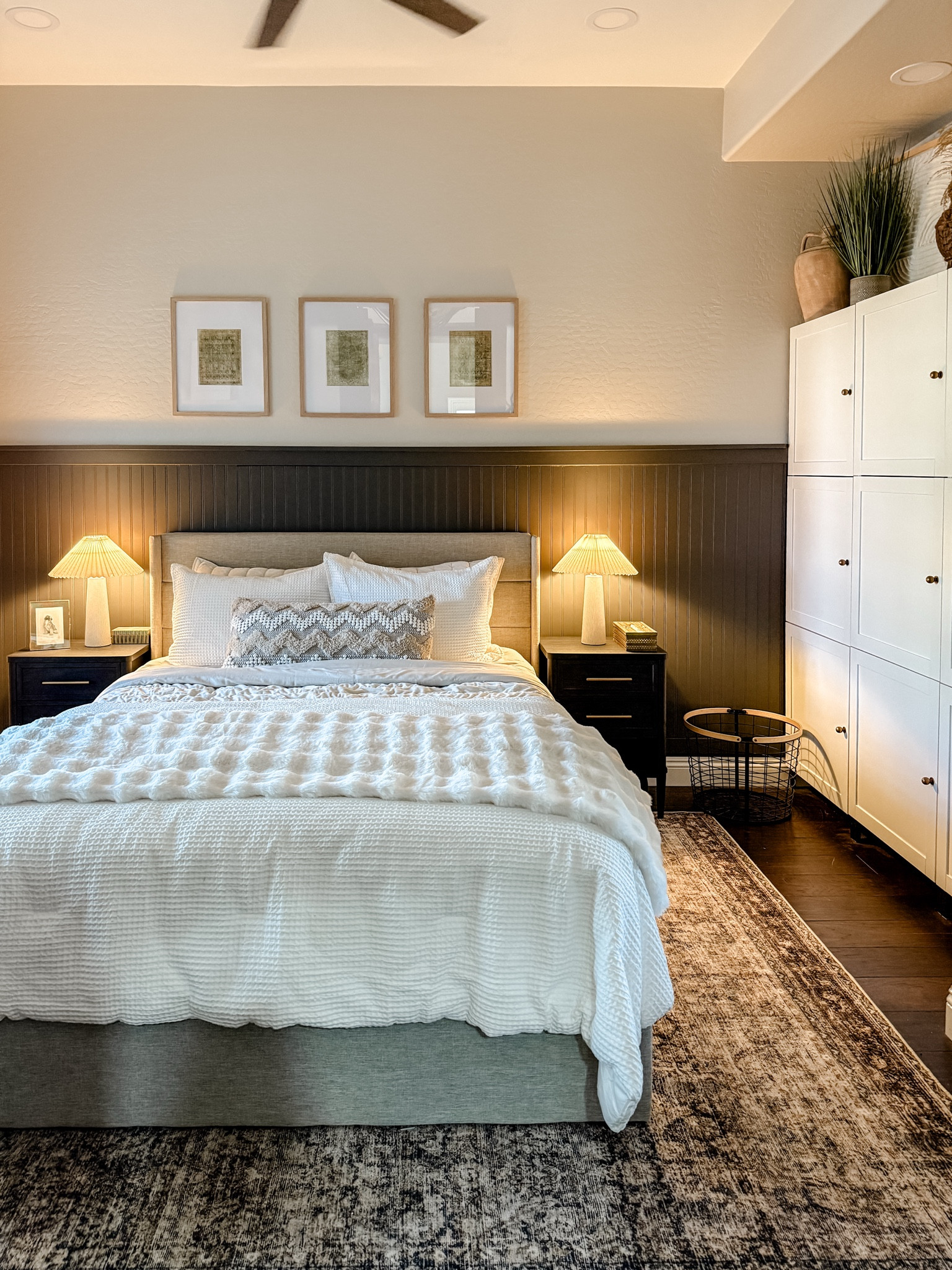 Loving everything in our new guest bedroom from the new lift top bed frame, to the cozy bedding to the soft rug, layered lamp lighting and of course the diy board & batten wall! (Full video on YouTube!)

#LTKFamily #LTKSaleAlert #LTKHome