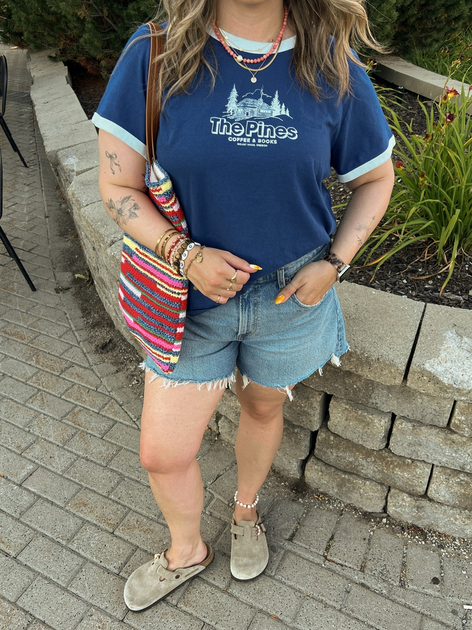 Casual summer outfit!! Sized up to XL in the graphic for an oversized fit. Canadian tee & tote bag links under “similar products”. Also sized up to 32 in the denim shorts for a loose fit. Birkenstock clogs are super comfy, I’m a 9.5-10 shoe and wear a 40.

#LTKsummer #LTKmidsize #LTKsale