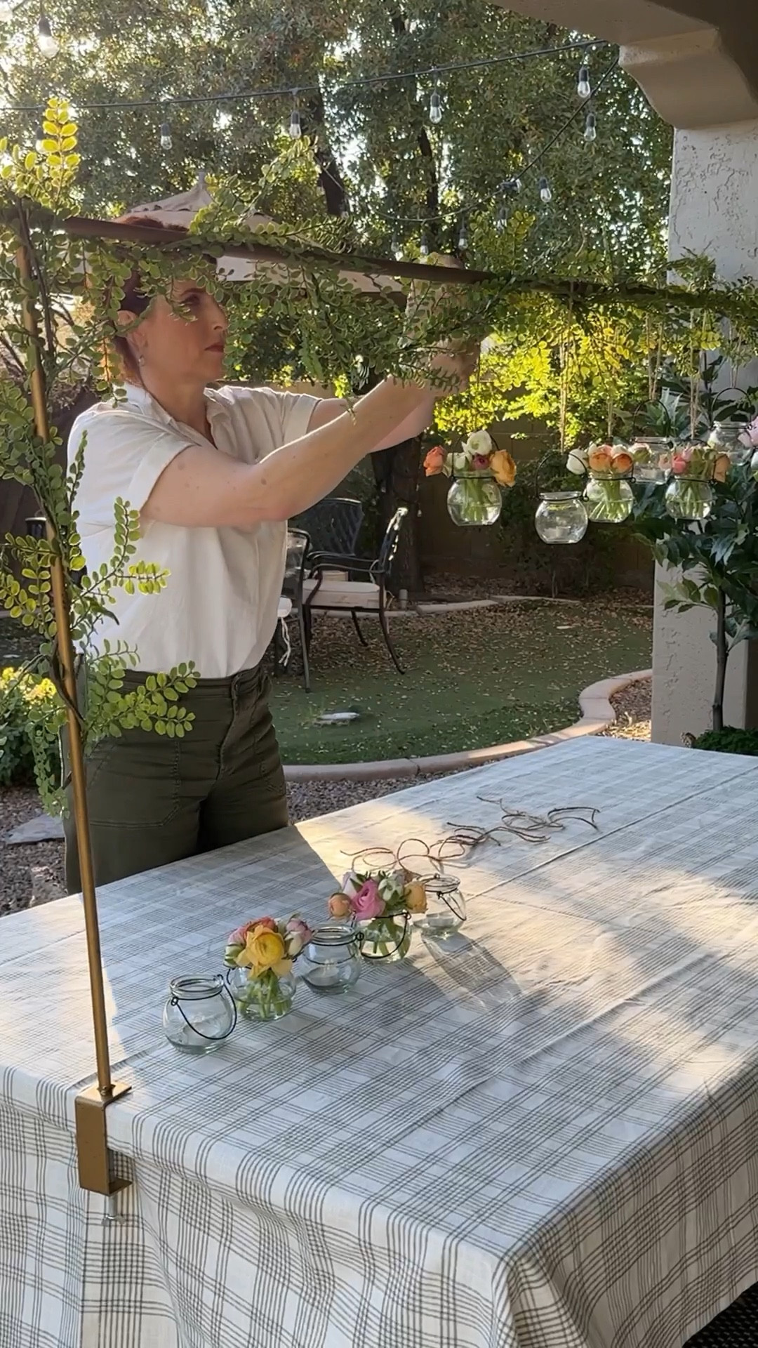 This adjustable over the table rod has endless creative tablescaping possibilities! Great for brunch, ladies lunch, tea parties, bridal showers, birthdays and various other  special occasions. 

Use real foliage and fresh flowers from your garden or go with faux greenery, stems and flowers, balloons, beaded garlands etc… 

The little hanging jars are great for flowers or tea lights 

#homedecor #tablescape #tabledecor accessories for table rod 

#LTKhome #LTKSeasonal #LTKVideo