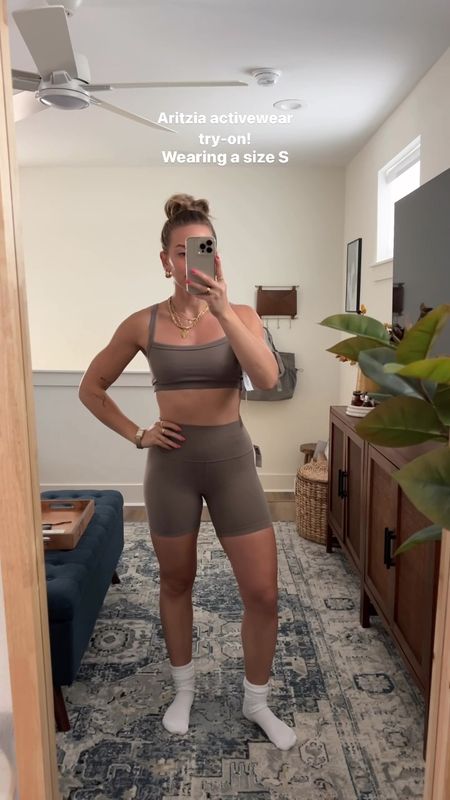 Shop the new activewear line, Golden, from @aritzia! Wearing a size S in top & bottom for reference! Activewear, chic activewear, aesthetic activewear, activewear sets, workout sets, biker shorts set, slouchy socks, slouch socks, workout outfits, workout outfit inspo #aritziapartner