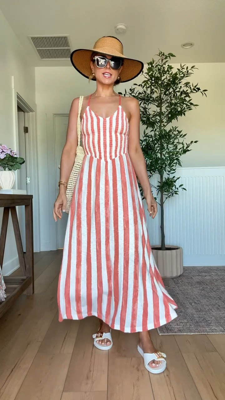 My beach outfit of the day! XXS in striped maxi dress! Beach day. Resort outfit. Resort wear. Vacation outfit. Vacation dress. Tory Burch buckle jelly sandals. Eric Javits packable UPF 50+ hat. Target straw bag. Gucci sunglasses. 


#LTKootd #LTKTravel #LTKSwim