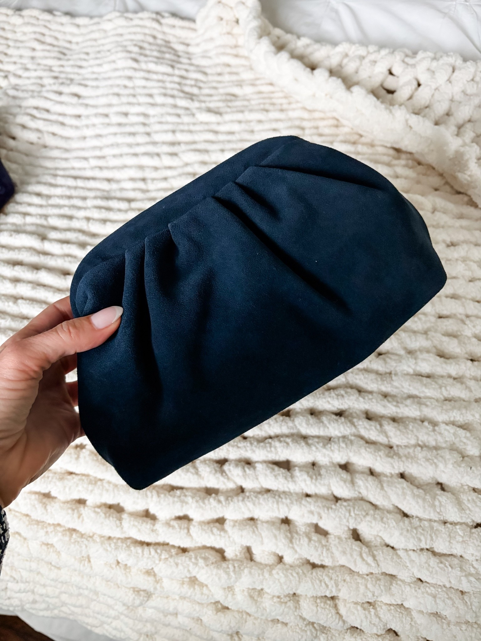 Navy pouch clutch on sale at Nordstrom!

#LTKSaleAlert #LTKOver40