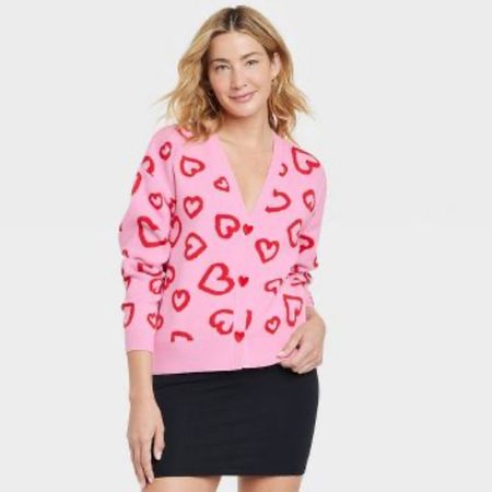 Target heart cardigan 
Heart buttons 
Felt heart buttons 
Graphic target sweater 

#LTKGiftGuide #LTKHoliday #LTKSeasonal