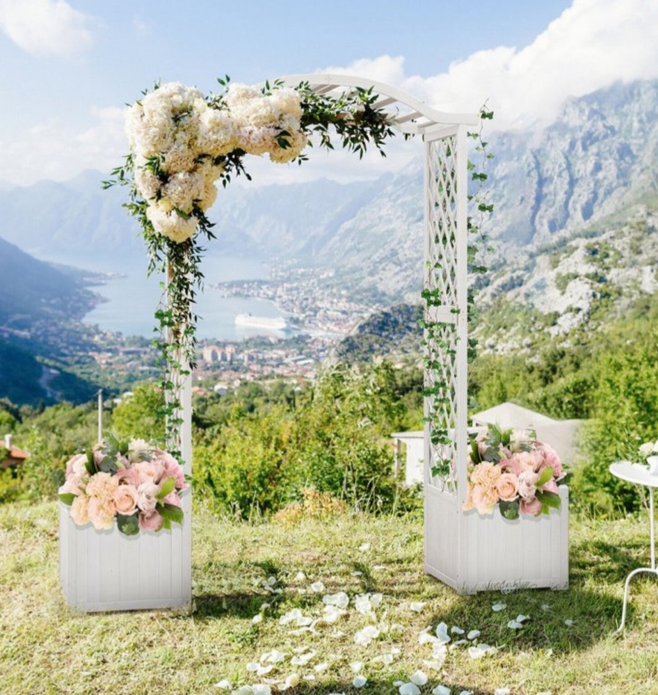 Transform your garden into a picturesque paradise with the Garden Arbor from Target! Crafted from 100% natural fir wood, this durable arbor is crack-resistant and painted for long-lasting outdoor use. Plus, the two large planter boxes with elevated legs ensure stability, so you can grow your favorite blooms and herbs with ease.

Let your creativity flourish with the arch top and trellis sides, providing ample space for plants to climb and decorations to shine. Whether it's colorful balloons, fragrant flowers, or delicate wind chimes, this arbor is your canvas to customize.

Designed for convenience, the planter boxes feature drain holes for optimal water drainage and soil nutrient retention, ensuring a thriving garden all season long.

From backyard retreats to wedding ceremonies, the rustic garden arbor adds charm and elegance to any outdoor space. Make a statement at your next gathering and impress your guests with the beauty of nature.

Don't miss out on this sale to elevate your outdoor oasis – shop now at Target and bring your garden dreams to life!

#LTKSaleAlert #LTKSeasonal #LTKHome

#LTKParties #LTKStyleTip #LTKWedding
