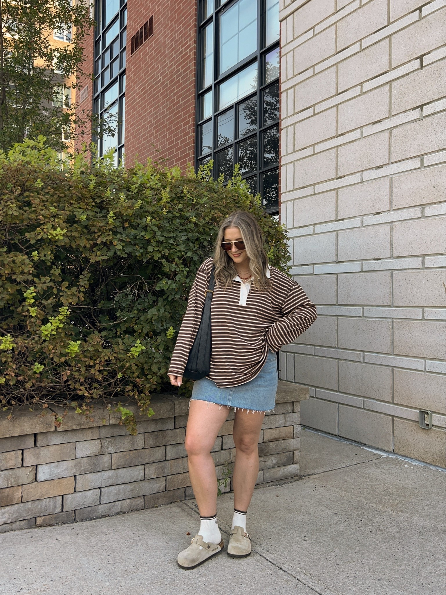 Early fall outfit! Wearing L in the striped rugby polo top, it’s very lightweight so still works for warmer weather! I bought this denim skirt last year in a size 32, would do a 31 if I was purchasing now. I’m a 9.5-10 shoe and wear a 40 in the Birkenstock clogs

#LTKfall #LTKsale #LTKmidsize