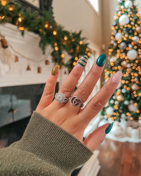 Winter nails. Christmas nails. Holiday nails. Candy cane mani. Gel nails. Nail inspo. Gucci ring. Nails inspo. Christmas manicure. Garland. Christmas tree. Green nails. 

#LTKHoliday #LTKSeasonal
