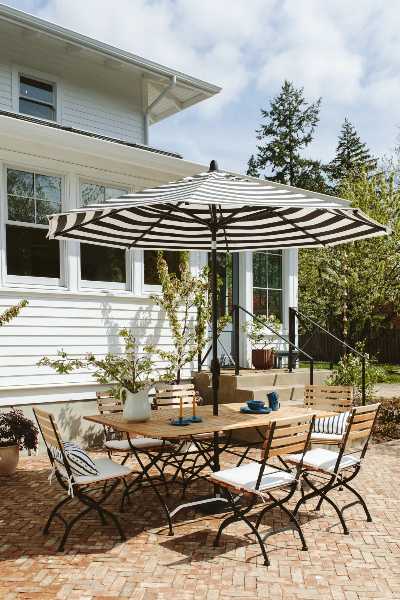 Happy Saturday from our kitchen patio and my favorite outdoor dining setup.  already spent many nights on this patio with family, kids playing soccer in the grass til 9 pm, grownups around the table, wine aplenty and I feel a flood of hope for the future, relief that we are happy here, and gratefulness for everything - have a great weekend. xx

#LTKfamily #LTKhome #LTKSeasonal