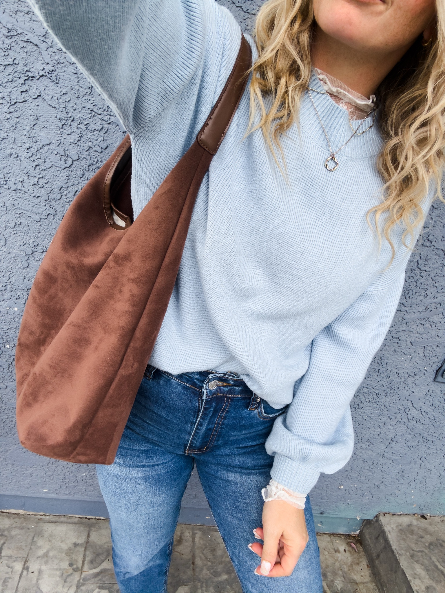 Winter outfit idea from amazon — oversized sweater layered with a white lace long sleeve top. Paired with a chocolate brown faux suede bag, and jeans (size down 1)

#LTKPetite #LTKFindsUnder50 #LTKootd