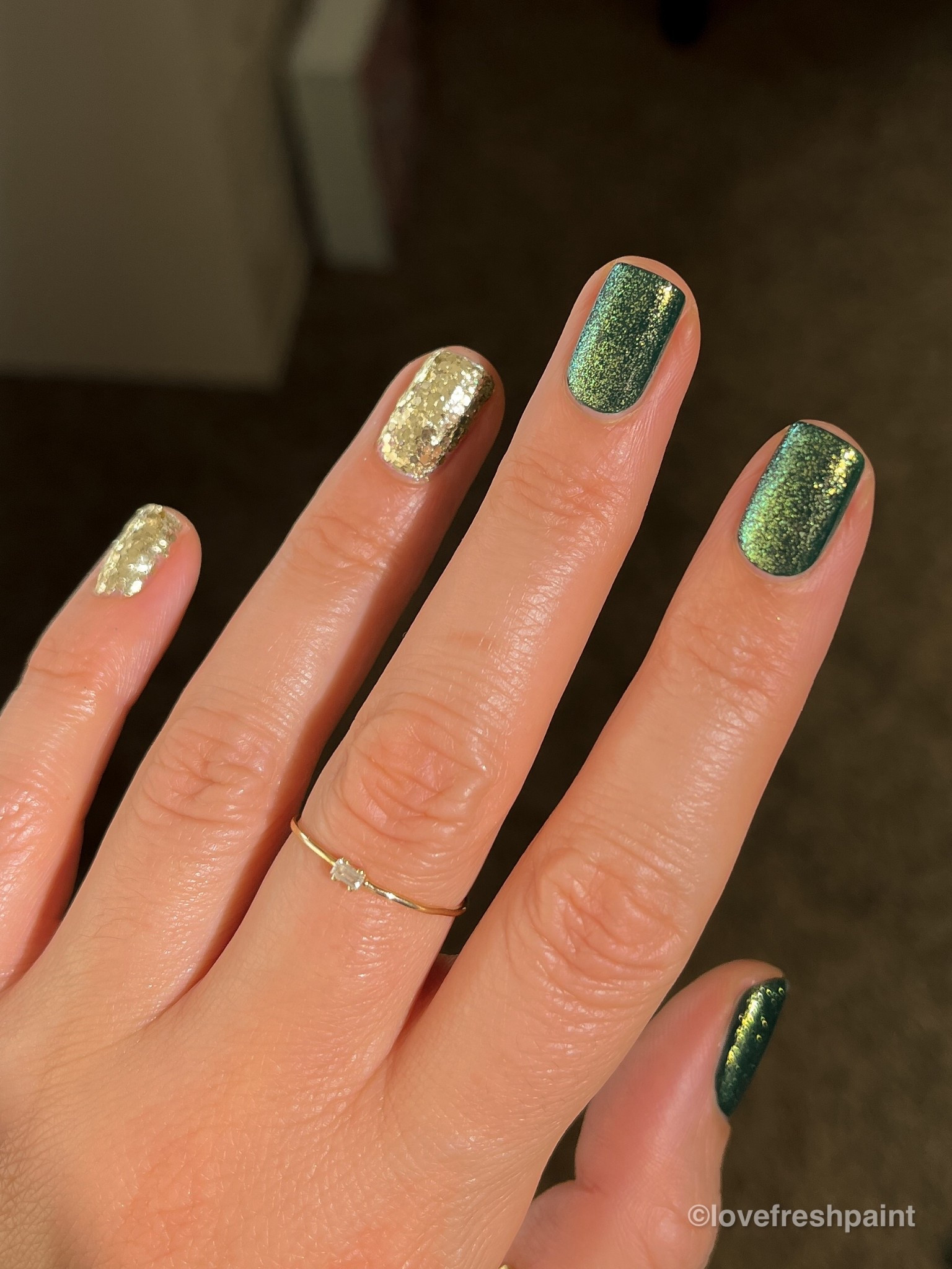 Gorgeous green and gold combo! I adore this look so much. 😍 Layer essie Off Tropic with essie Frosted Fantasy to get the look on my middle and ring finger! This is all regular nail polish!! 💅

Ring is from Honeycat Jewelry! Use the code “lovefreshpaint” to save some $$$! 💍 

#nailpolish #essie #christmasnails

#LTKBeauty #LTKHoliday #LTKSeasonal