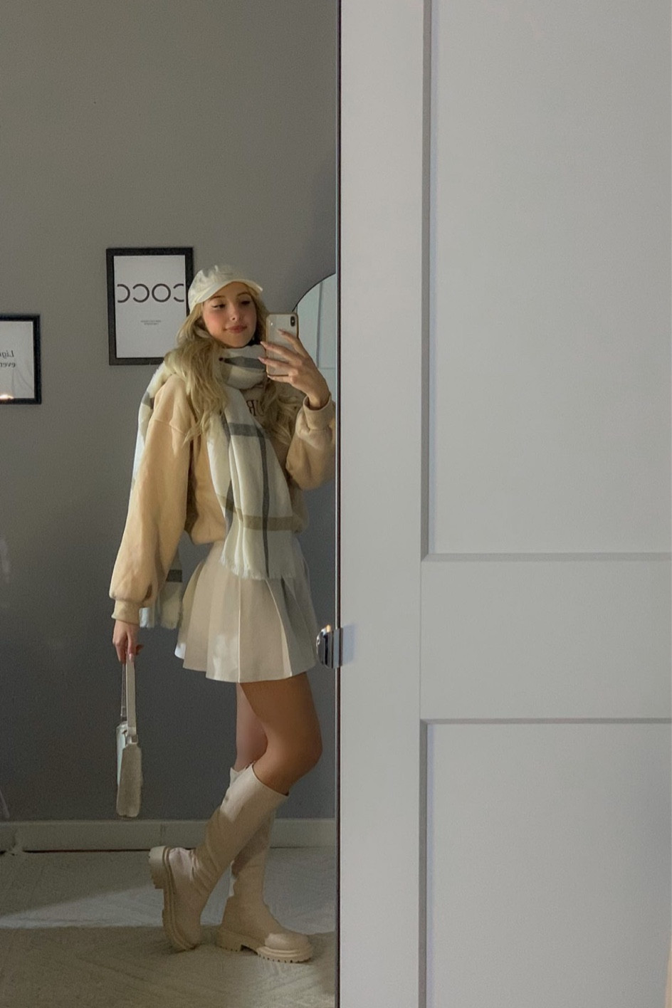 white tennis skirt, white boots, beige hoodie 

#LTKunder50 #LTKstyletip #LTKFind