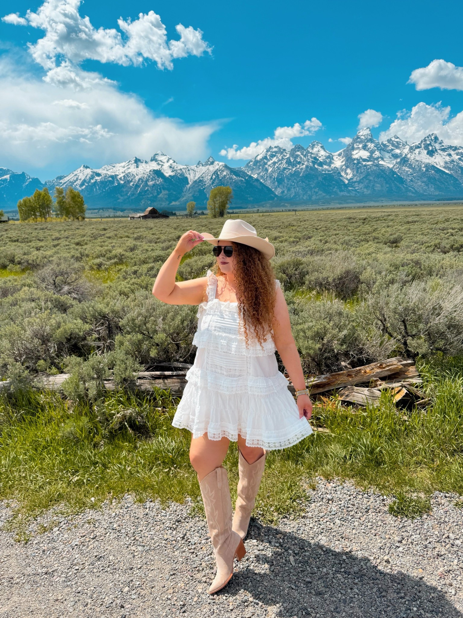Ruffles in the wind, boots in the dirt 🤍👢 standing strong beneath the Grand Tetons 🏔️✨ cowgirl hat, open heart, and nothing but wild skies ahead 🤠🌬️💫 concert outfit | concert look | boho cowgirl | Nashville outfit | Nashville bachelorette look | Morgan wallen concert outfit | Taylor swift concert outfit | country concert outfit | western concert outfit | concert season | cowgirl boots | amazon cowgirl boots | beige cowgirl boots | amazon beige cowgirl boots | amazon boots | amazon finds | amazon fashion | amazon outfit | amazon look | amazon concert outfit | amazon concert finds | western concert outfit | western fashion | amazon western fashion | amazon western outfit | dress | amazon dress | amazon white dress | white dress | ruffle dress | white ruffle dress | amazon cowgirl hat | cowgirl hat | amazon neutral cowgirl hat | spring concert | spring concert outfit | spring western outfit | grand Teton | grand Teton outfit | grand Teton outfit inspo | grand Teton trip | Yellowstone trip | Yellowstone outfit inspo | Yellowstone vibes  

#LTKSummerEdit #LTKMidsize #LTKStyleTip