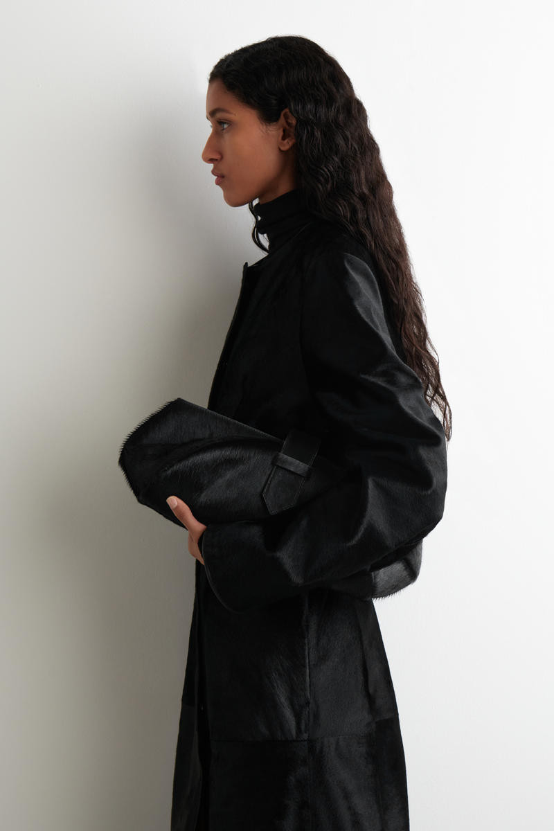 COS Women's Belted Clutch Bag Pony Haireffect Leather in Black | Cow Leather | COS (AU)