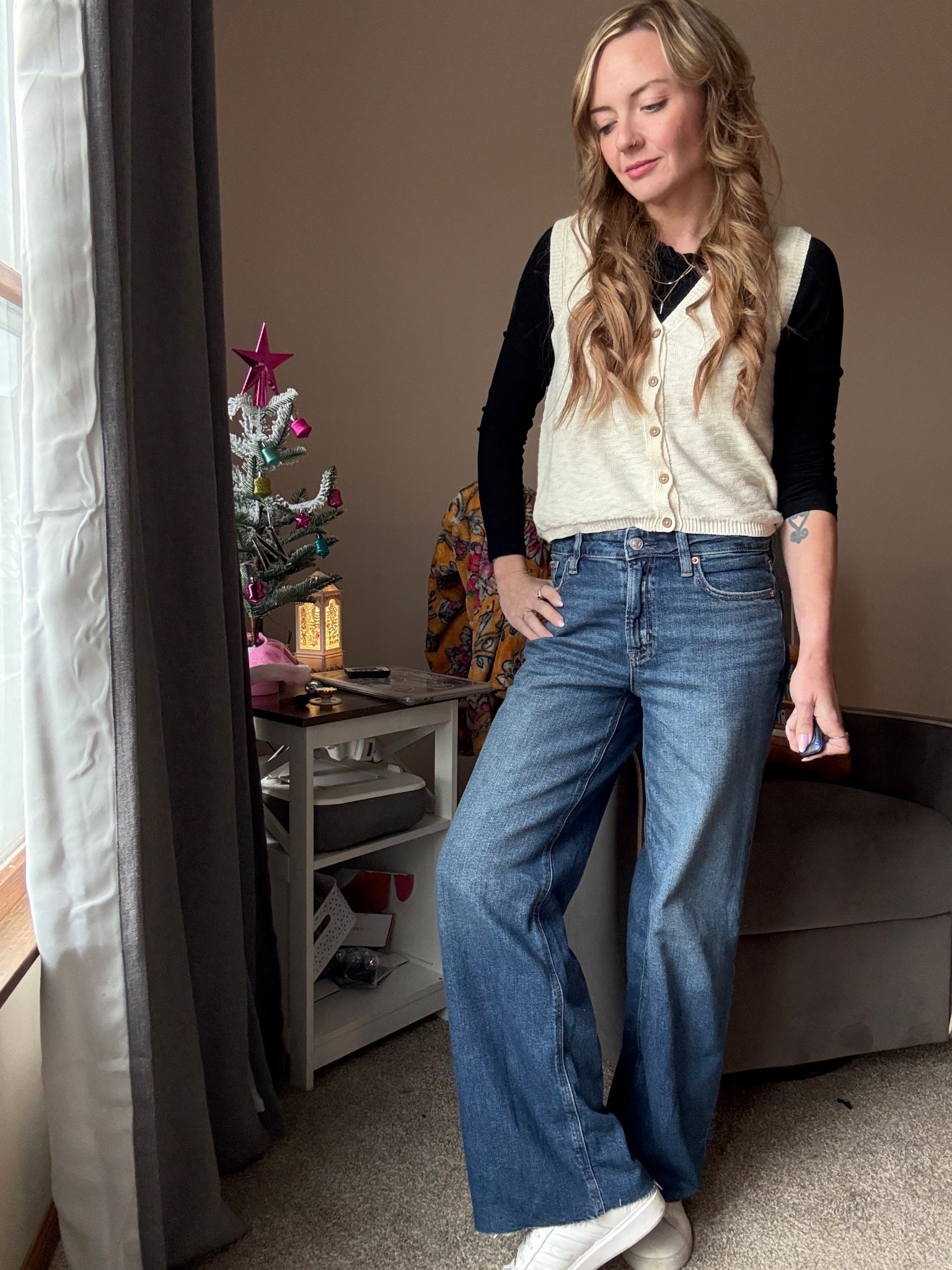 Working on building my cold weather wardrobe. Cozy holiday outfit energy with my favorite American Eagle jeans in size 0. The fit is relaxed, comfy, and perfect for fall and winter layers. Styled with a soft knit vest and a simple long sleeve for an easy everyday look you can dress up or down. 

#LTKootd #LTKSeasonal #LTKHoliday