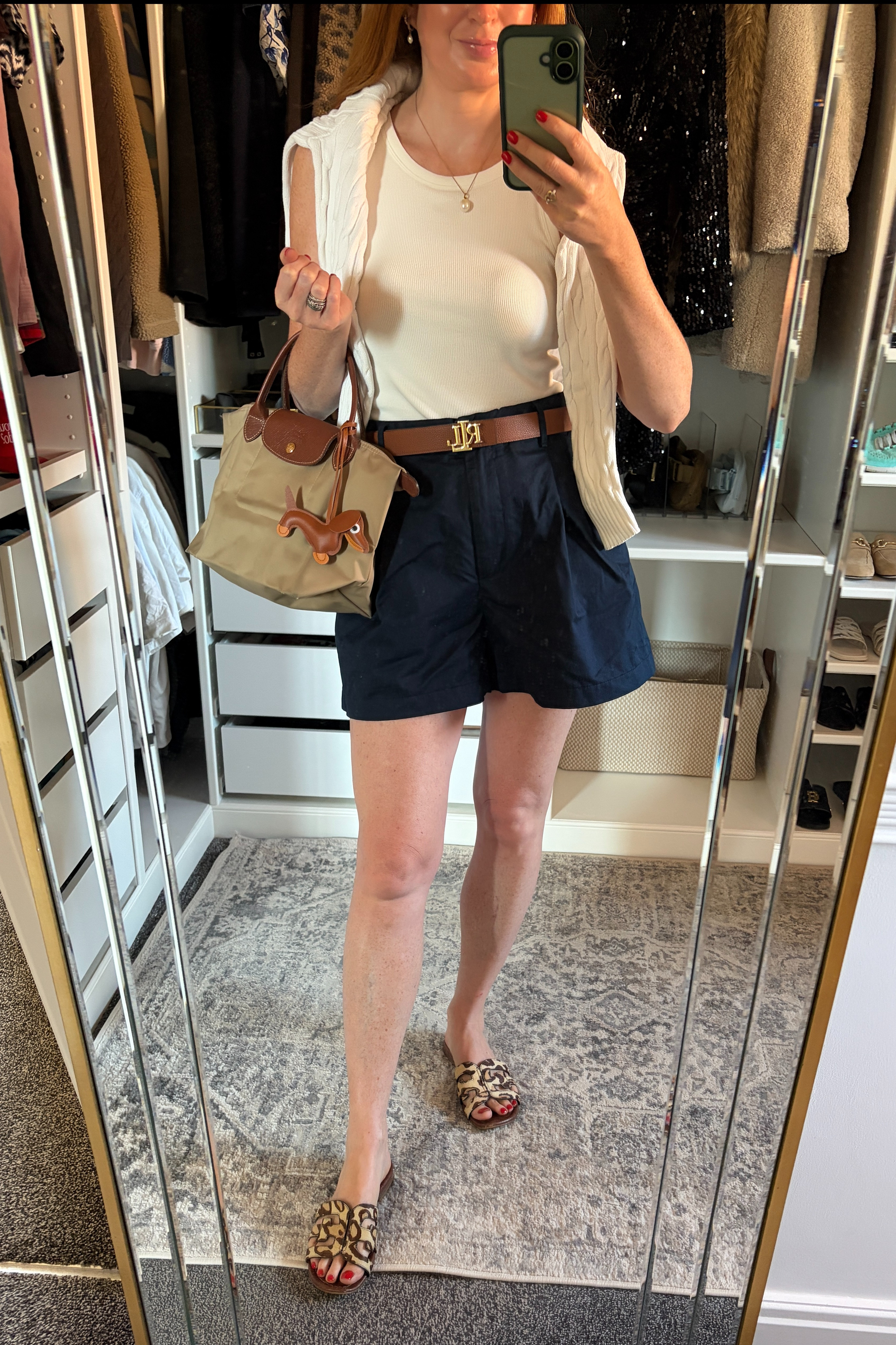 An easy outfit for summer days when I want to feel comfortable but still look pulled together 💙🤍 Classic staples including my go to navy chino shorts, polished details, and a few timeless accessories. @tommy @samedelman @UNIQLO

#LTKuk #LTKsummer #LTKstyletip