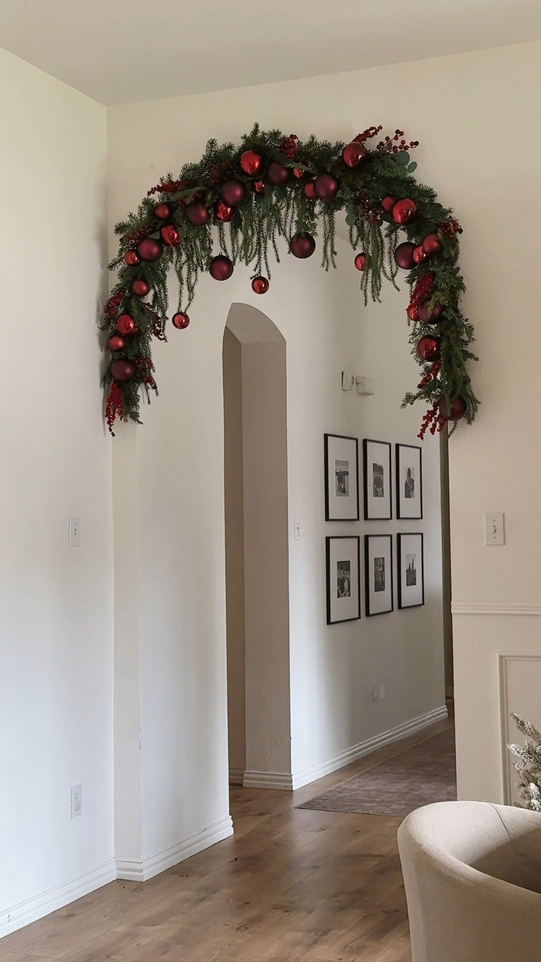 Holiday garland above our arch!! 

#LTKHome #LTKHoliday