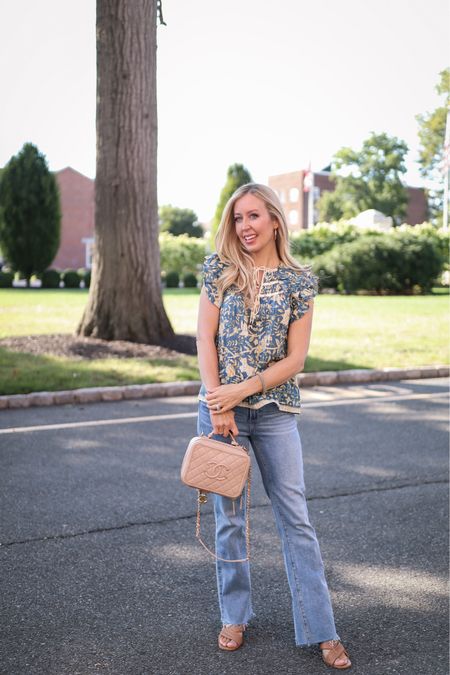 Wearing my favorite transition into fall jeans- the flare leg Laurel Canyon jeans by Paige. Flare leg jeans are a big fall 2022 trend. They look great with anything from sandals, to flats, boots, and heels. 
I’m wearing a size 24 in the jeans, and a 00 in the top. 

#ltkfall #ltkfallstyle 


#LTKstyletip #LTKSeasonal