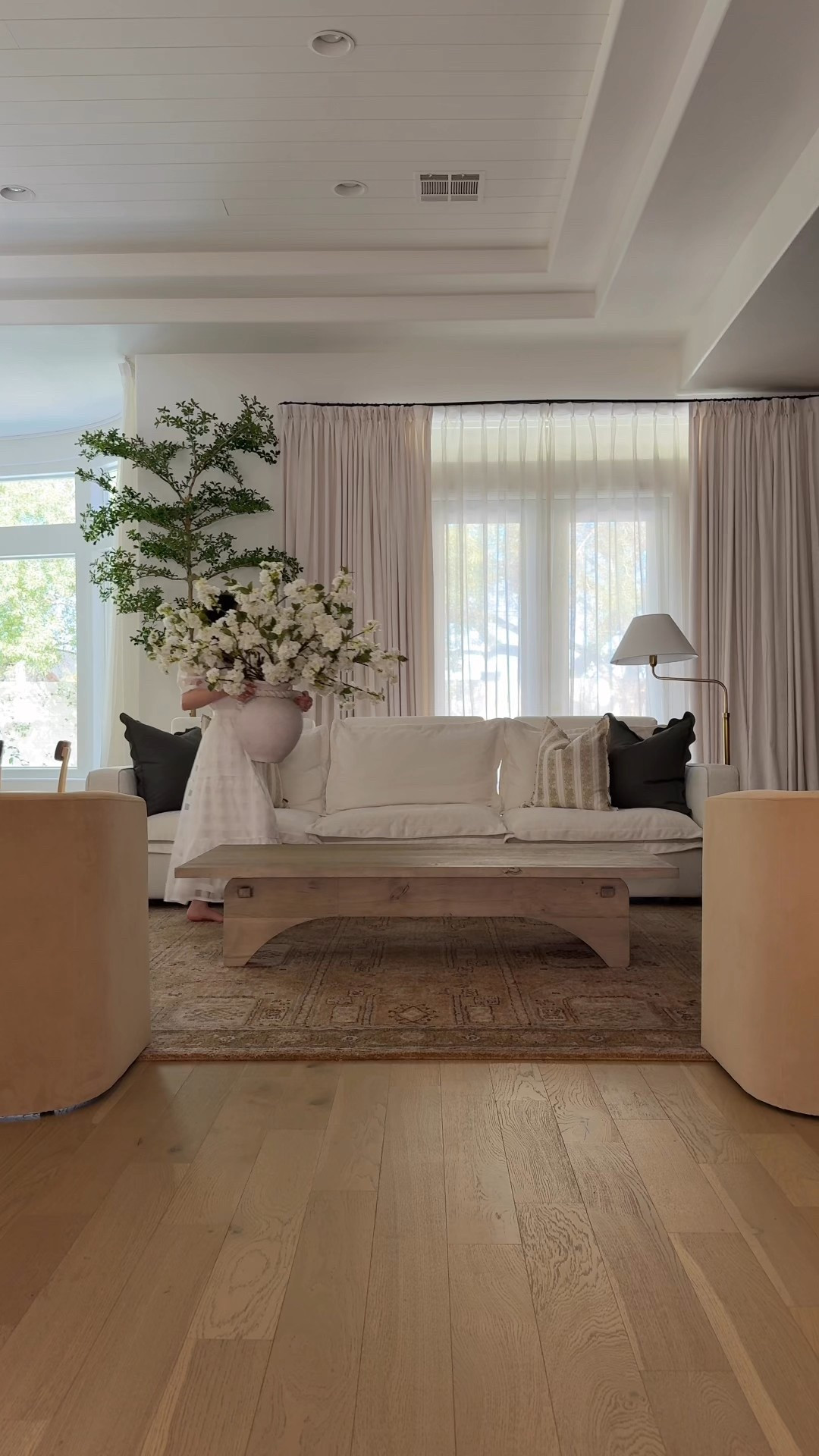 Living room - Code JILLHIGGINSON for 20% off at Alice Lane (cherry blossoms) 

Couch, chairs, coffee table, faux stems, curtains, tree

#LTKHome #LTKdayinmylife #LTKmomlife