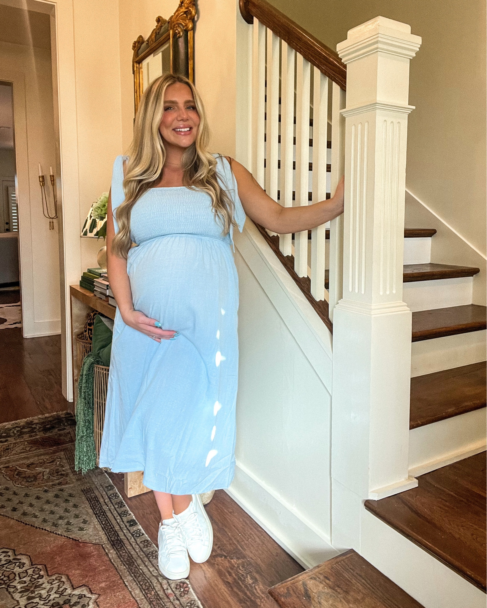 The sweetest linen like material, baby blue tie strap shoulder smocked bust midi dress that is in essential in my closet. I’m wearing here with sneakers to dress down, but could also wear with heels to dress up. From pink blush maternity as well, wearing a medium at 33 weeks pregnant here, but could probably do a large. Would also be such a good beach or pool cover up. Perfect for after baby or non-maternity as well!

#LTKunder100 #LTKbump #LTKSeasonal