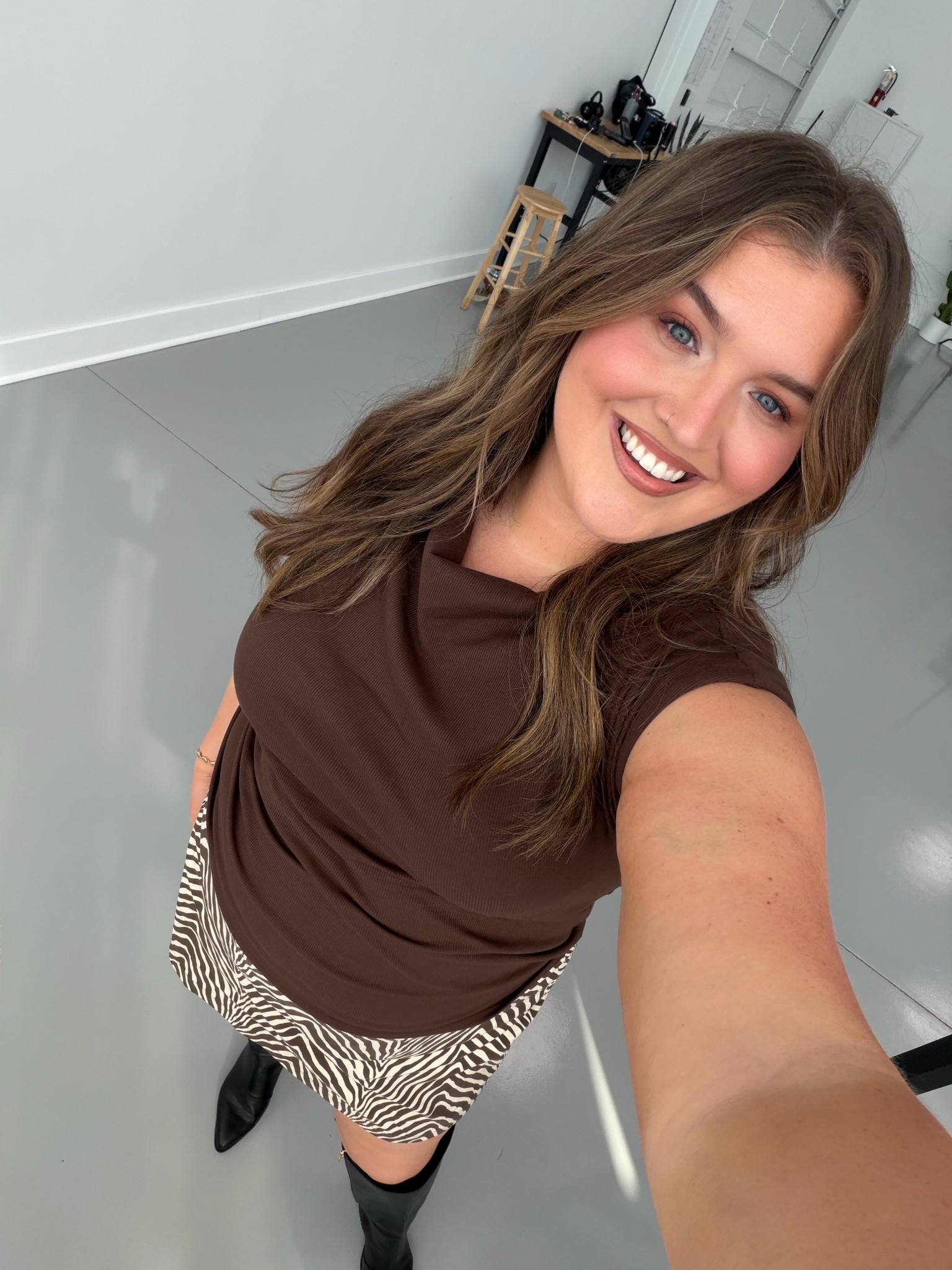 Loved this outfit for a day modeling in the studio 🤎✨ Zebra print is trending and this skort is comfortable and stretchy! Wearing a size XXL in top and bottom
Boots are extra wide calf + fits with room

#LTKPlusSize #LTKootd #LTKMidsize