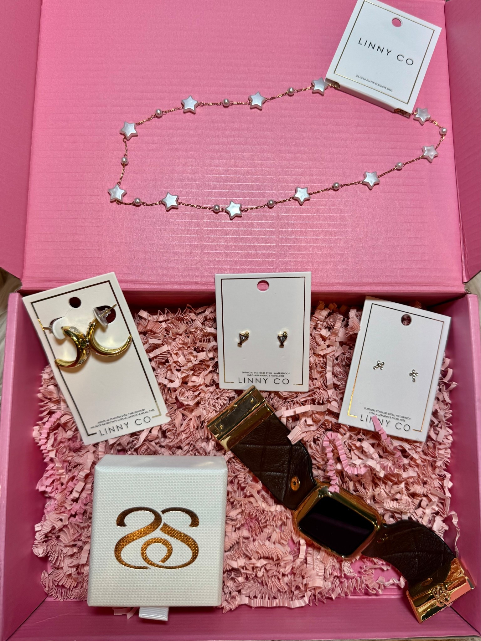 Fun minimal jewelry that shows your personality. Martini glasses, crosses, stars and pearls . 