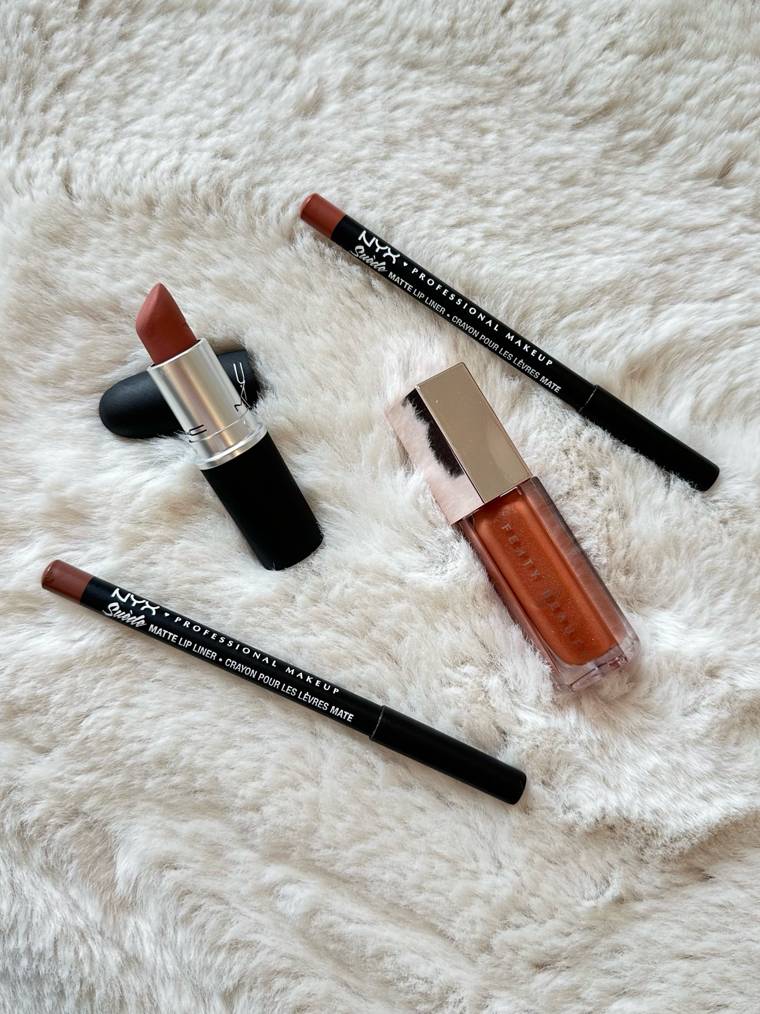 Go-to #lipcombo, for that perfect pouty peach. I outline or overline if that's your thing too, partially fill in then swipe on a powder matte lipstick and blot. If you want shine reach for this best gloss-- this #fenty #lipgloss is all the hype, run to #ulta. #beauty #beautyhaul

#LTKbeauty