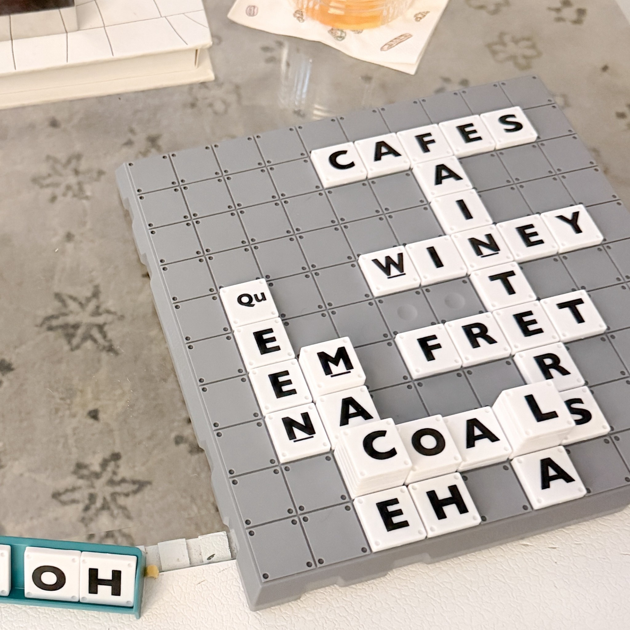 Game night at home playing upwords which is a similar but slightly more fast paced & less intimidating word game similar to scrabble but where you build up, and score points based on tile count instead of letter difficulty. Board game, game night

#LTKSaleAlert #LTKHome