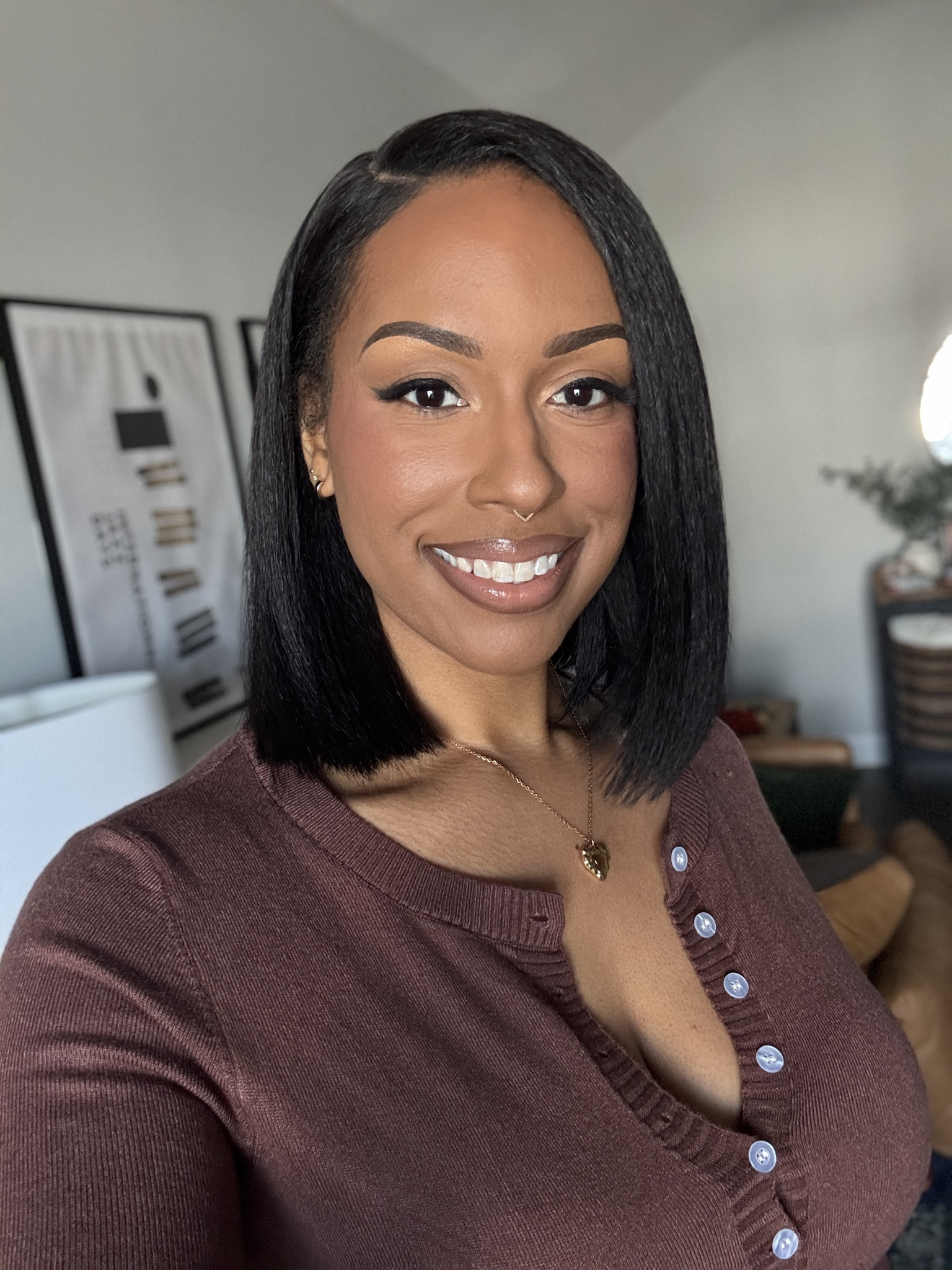 My favorite synthetic bob EATS! Outre Breanne in color 2. Worn behind the hairline and cut 2 inches in the front because I like an even bob. 