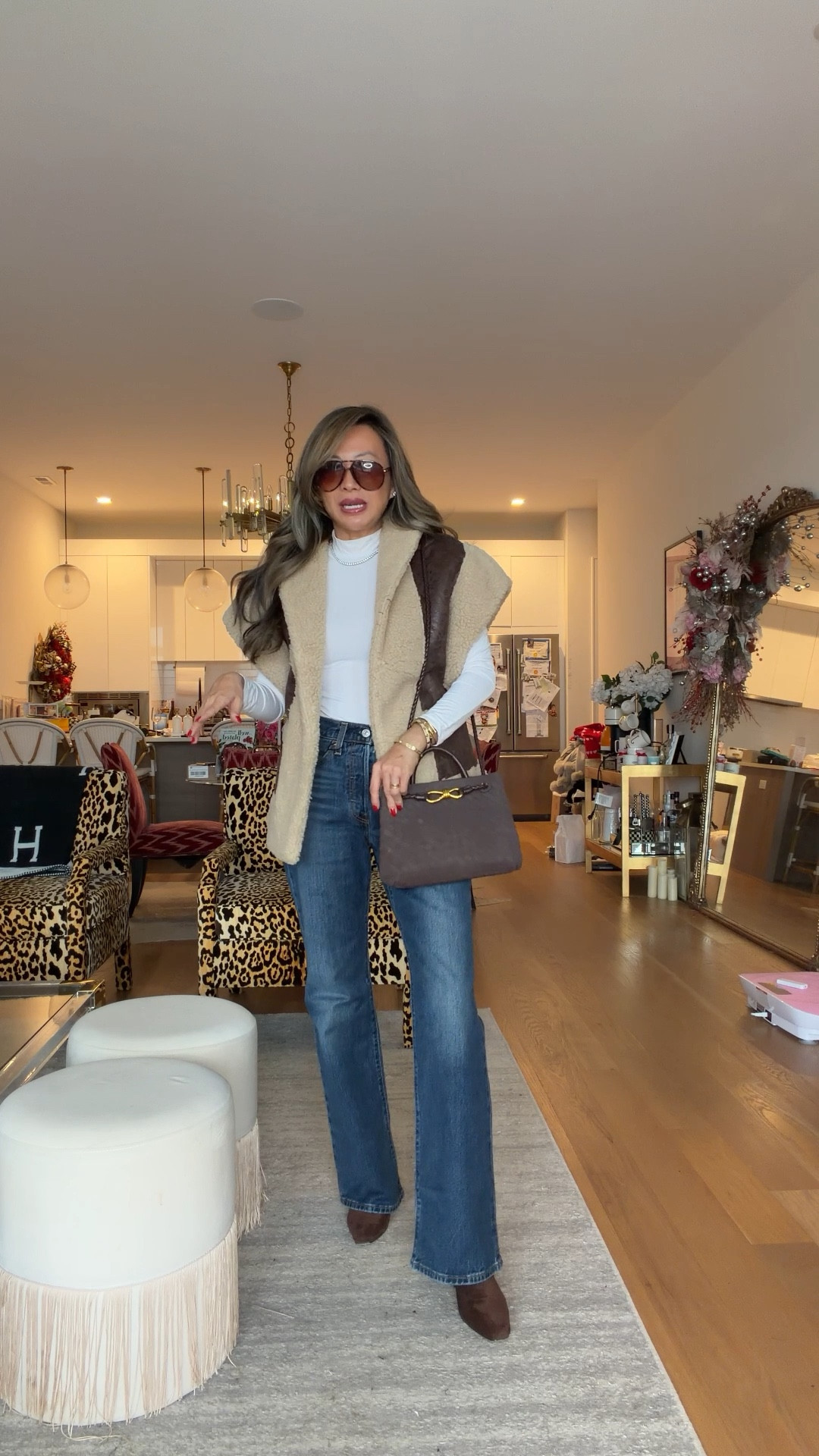 Winter outfit, shearling vest, Amazon bodysuit, under $100 Jean size 27. I sized up. Amazon boot and bag. Size small in vest 

#LTKootd #LTKmomlife #LTKgrwm