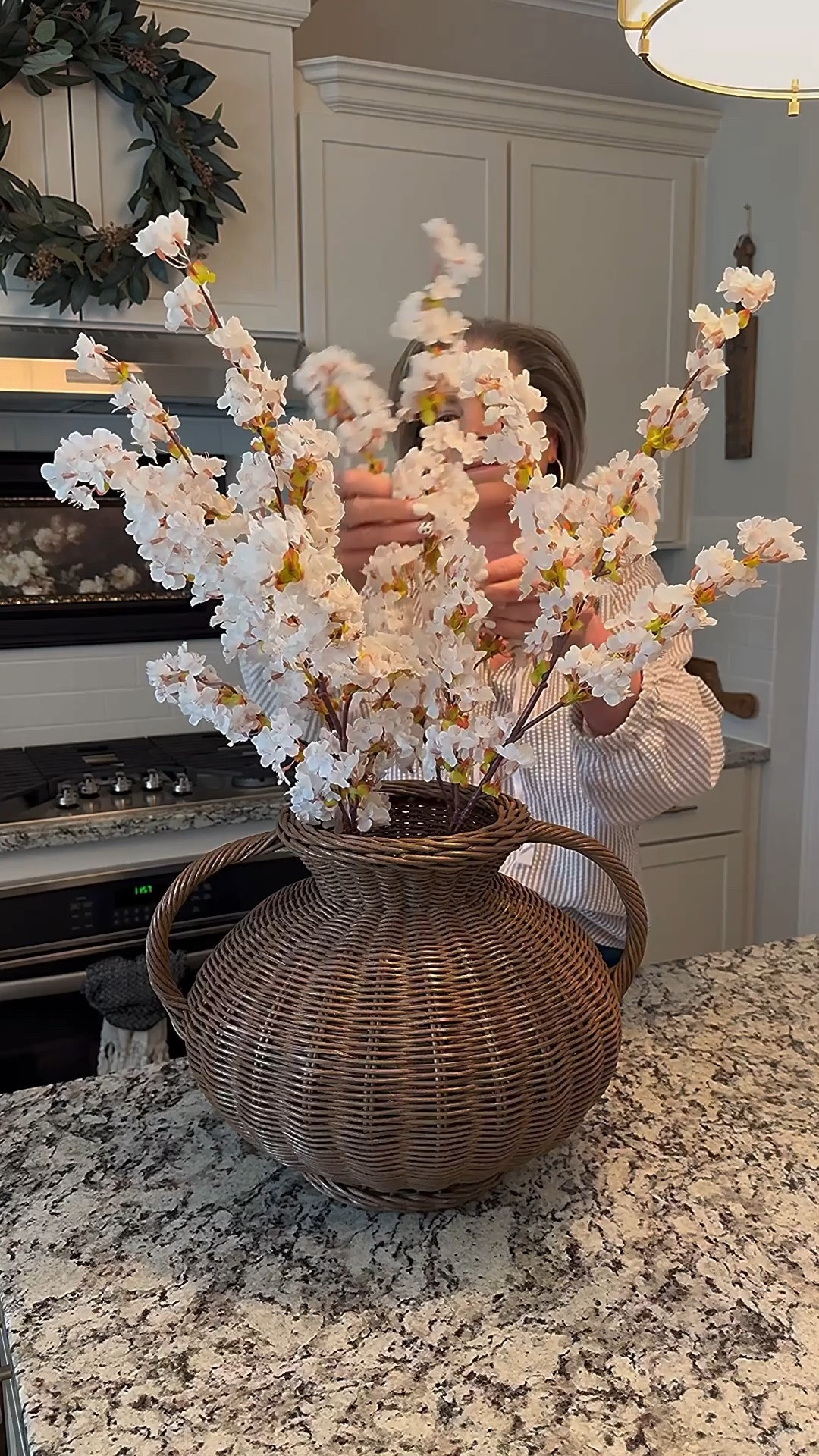 This is my 2nd season using these beautiful white cherry blossoms. They are gorgeous and very affordable. My woven vase continues to be a favorite and comes with a glass cylinder.

The cherry blossoms come 4 stems in a pack. I used 1 pack in my arrangement. 

Cherry blossoms, woven vase, gold tray, wreath, blouse


#LTKstorytime #LTKHome #LTKSeasonal