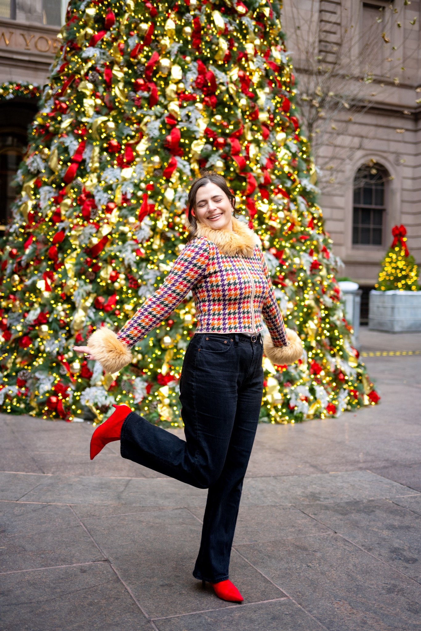 Love a festive outfit for the holidays. If you’re doing some holiday shopping or just going to meet a friend for coffee this fur trimmed cardigan is such a great statement piece. The red boots really tie it all together  

#LTKSeasonal #LTKootd