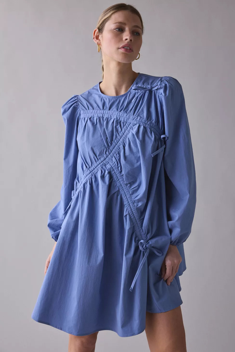 Ghospell Helosia Asymmetric Ruched Tie Long Sleeve Mini Dress | Urban Outfitters (US and RoW)