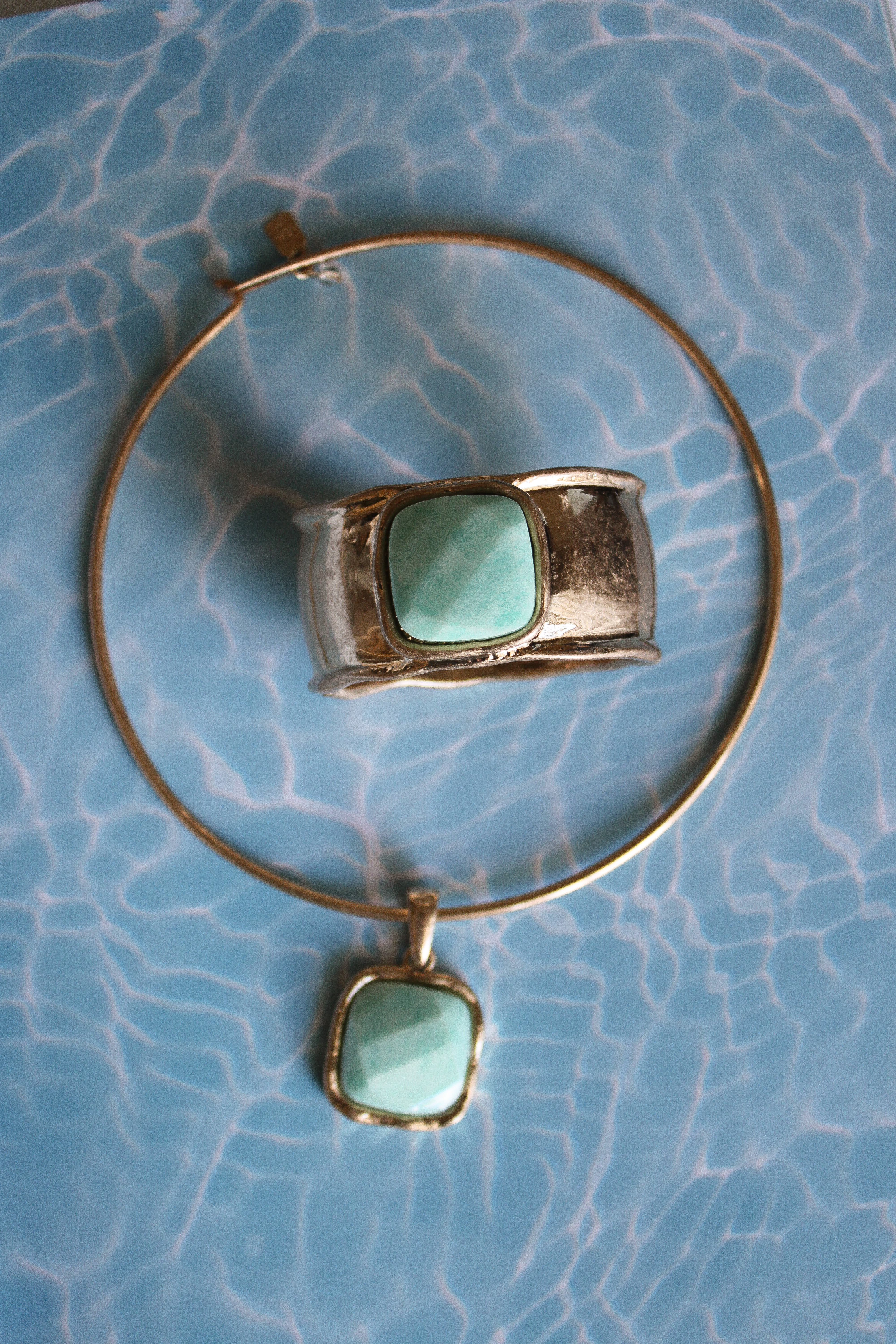 These stunning choker necklace and cuff bracelet are back in stock in a blue turquoise. Only $20 each, and they're solid! 

 