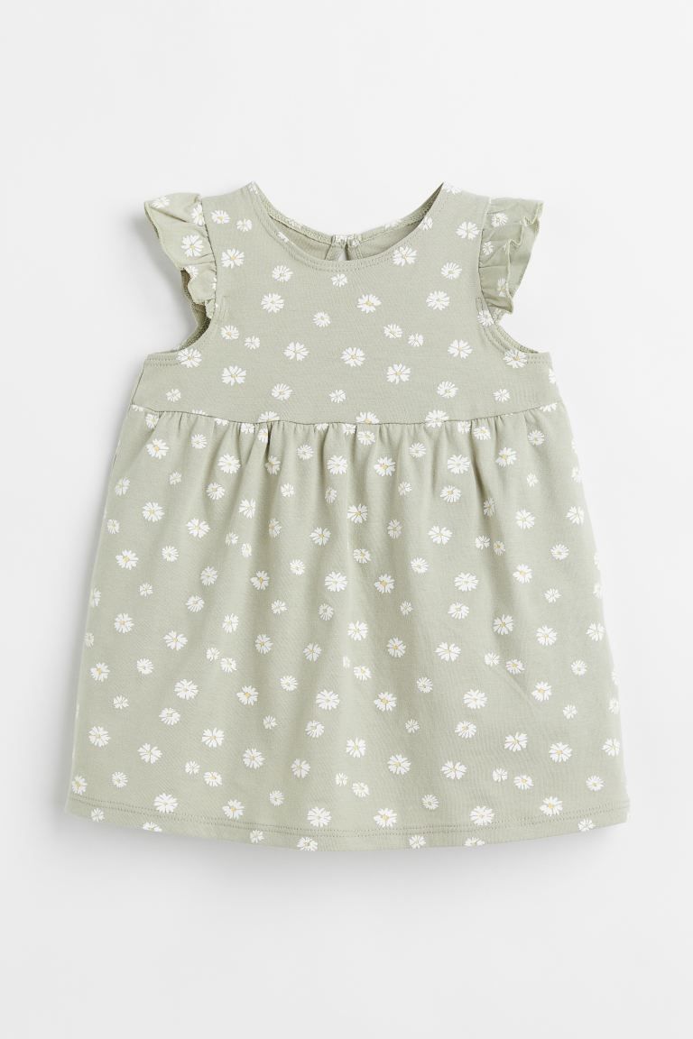 Sleeveless dress in soft cotton jersey. Ruffles at front extending over shoulders to back, small ... | H&M (US)