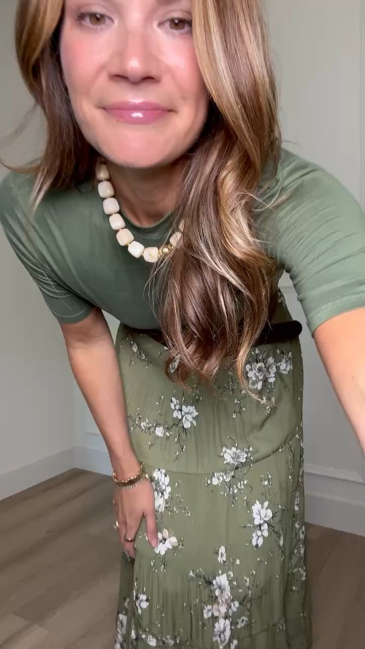 I love how this skirt moves! The flowy tiered shape gives it plenty of movement without adding too much volume, and the olive floral print feels perfect for transitioning into fall. I added the belt to define the waist and boots to bring out the deeper tones.

Floral midi skirt, fall outfit, tall girl fashion, olive green outfit, tiered skirt, transitional outfit, fall skirt outfit, tall girl style, StangandCo

#LTKootd #LTKSeasonal #LTKTall