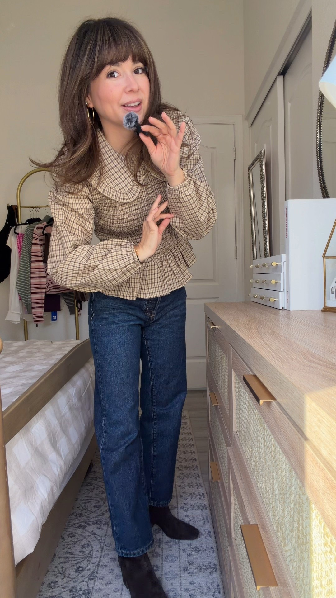 Petite-friendly outfit that feels easy but still put together.
This smocked top has such a flattering shape without feeling tight, and it pairs perfectly with classic denim for an everyday look that works for real life. Comfortable, feminine, and easy to wear on a 5’2 frame.

Top: XS
Jeans: 245petite-friendly length)
Boots: TTS

Sharing everything I’m wearing plus a few similar options I love.

(petite outfit ideas, everyday mom style, classic denim, feminine tops, repeat wear staples)


#LTKPetite #LTKHoliday